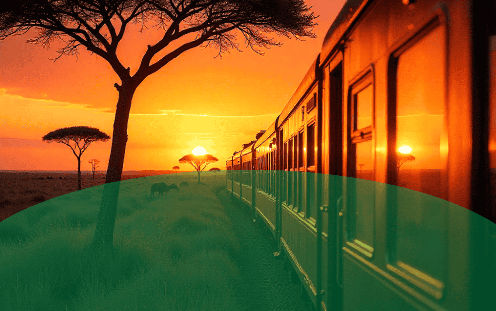 Restored luxury train crossing African savannah, representing the legacy of African railway heritage.